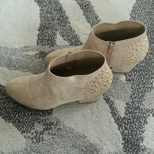 Decorative nude and gold tone ankle boots